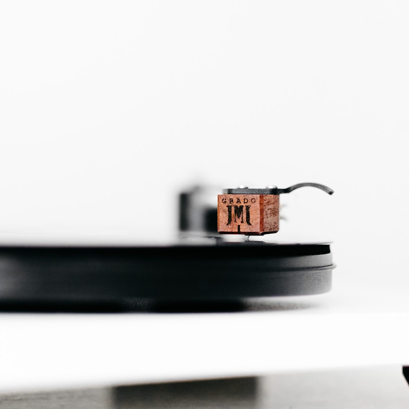 grado, grado headphones, grado labs, sunset park, brooklyn, new york, cartridge, turntable, deck, uturn, close up, vinyl, tonearm, phono, white, needle, stylus, diamond, wood, mahogany housing, statement series, brooklyn cartridge company, JMJ Logo